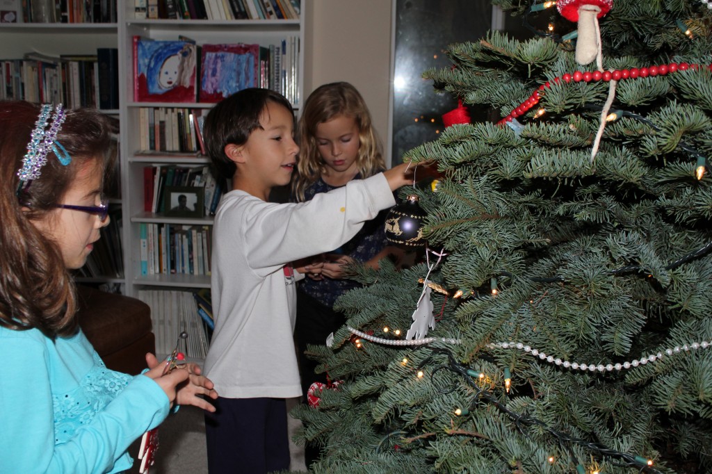 trimming Christmas tree